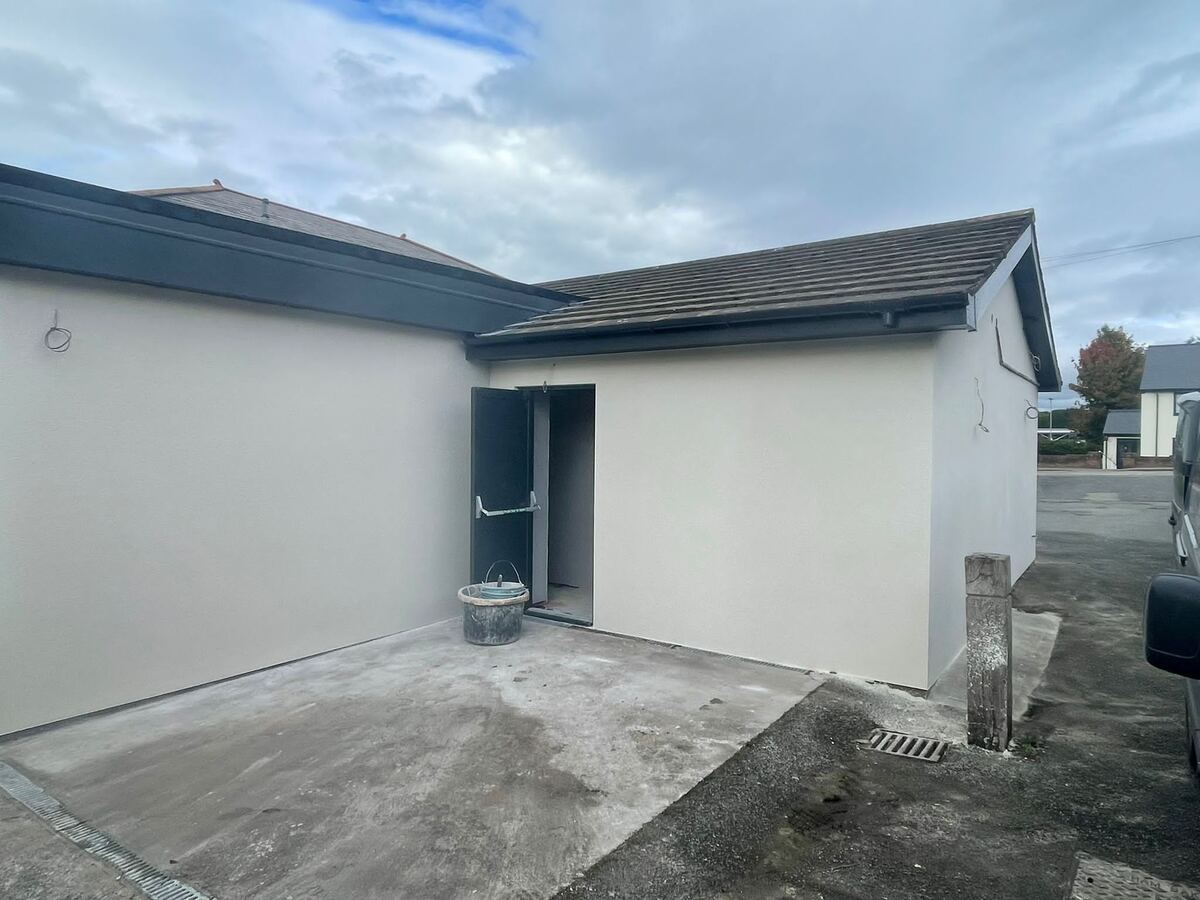 Rear of a bungalow in smooth light grey render