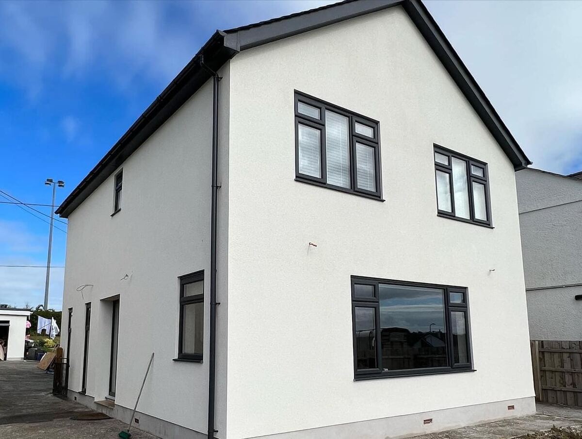 Gable end of a house in smooth white render