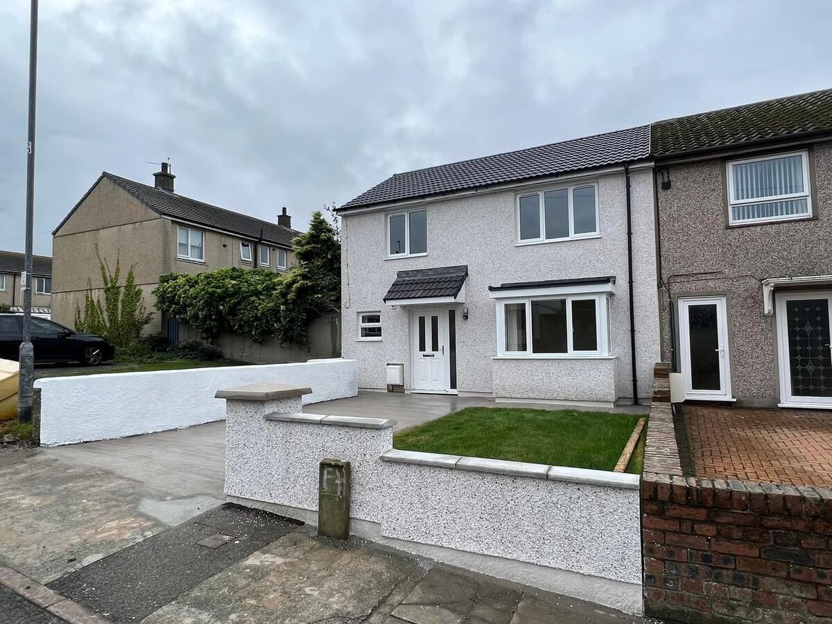 Semi-detached house re-rendered in white